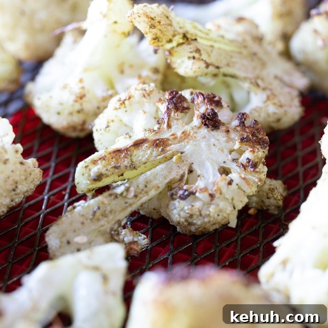 Roasted Cauliflower with Tahini Sauce and Sweet Dates 4 Zaatar roasted cauliflower in an air fryer basket.