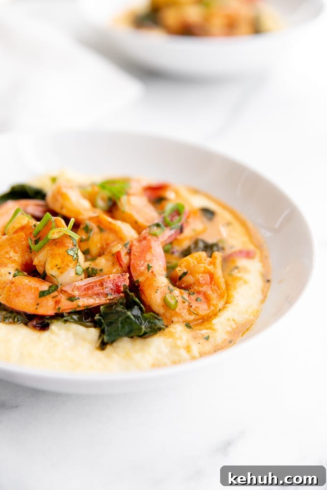 Coconut Sriracha Shrimp with Garlicky Kale Bowl 4 Coconut sriracha shrimp and kale over grits in serving bowl