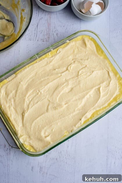 Smooth ricotta layer on raw lemon cherry cheesecake