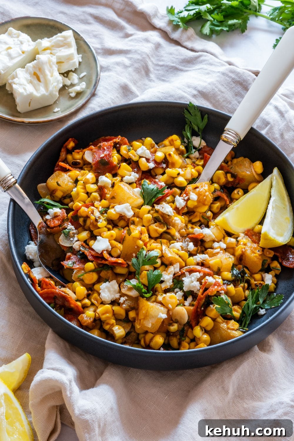 Grilled Corn Salad with Cherry Tomatoes and Lime Vinaigrette 6 Grilled corn salad with feta cheese and chorizo.