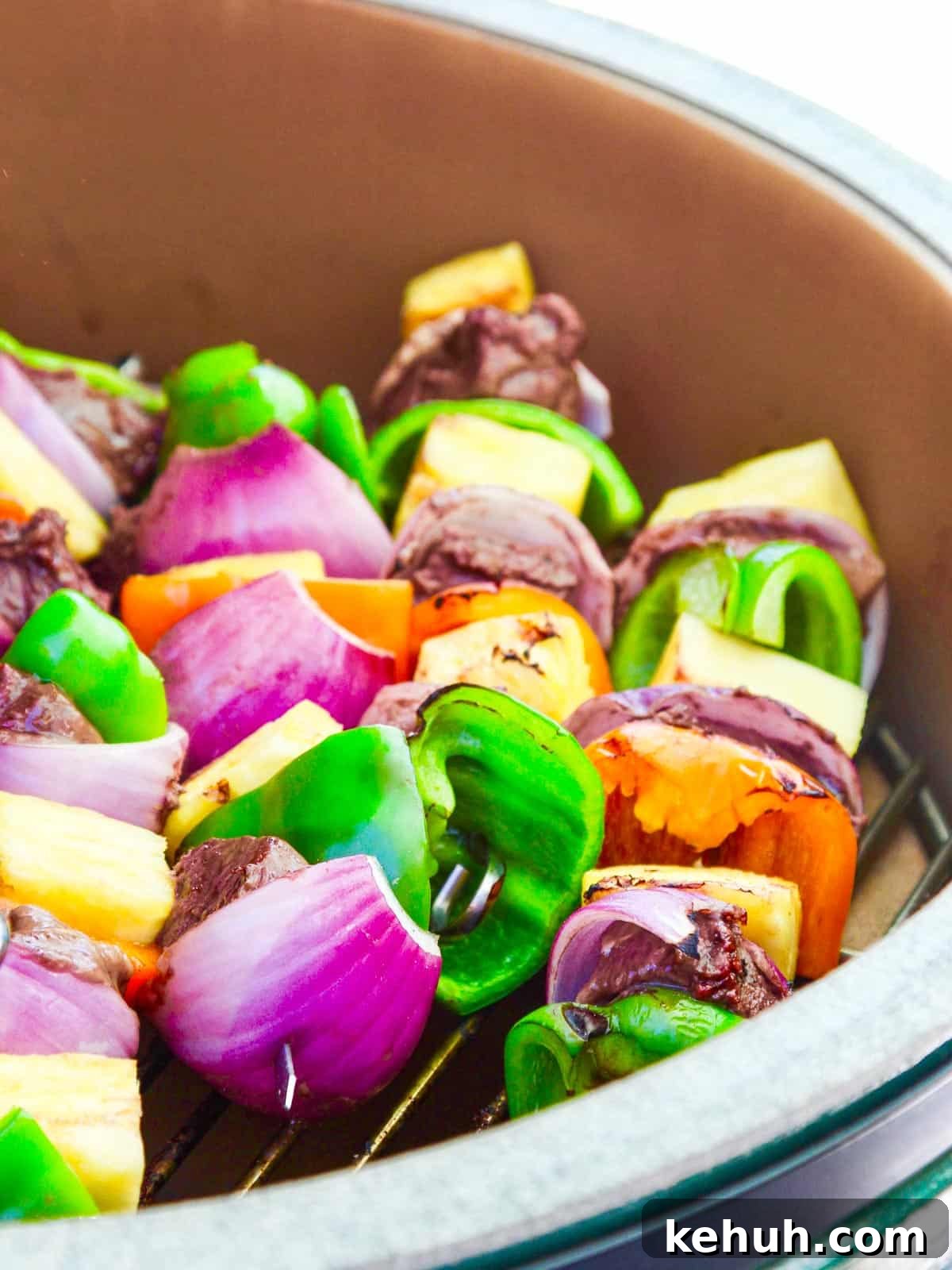 Grilling Shish Kabobs outside on a Big Green Egg over charcoal.