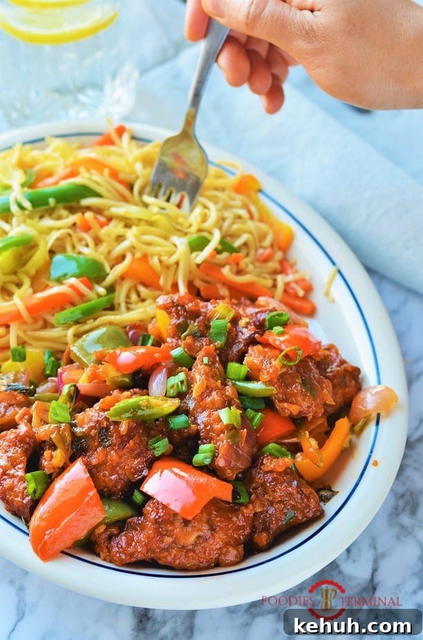 Chilli Chicken dry recipe garnished with scallions