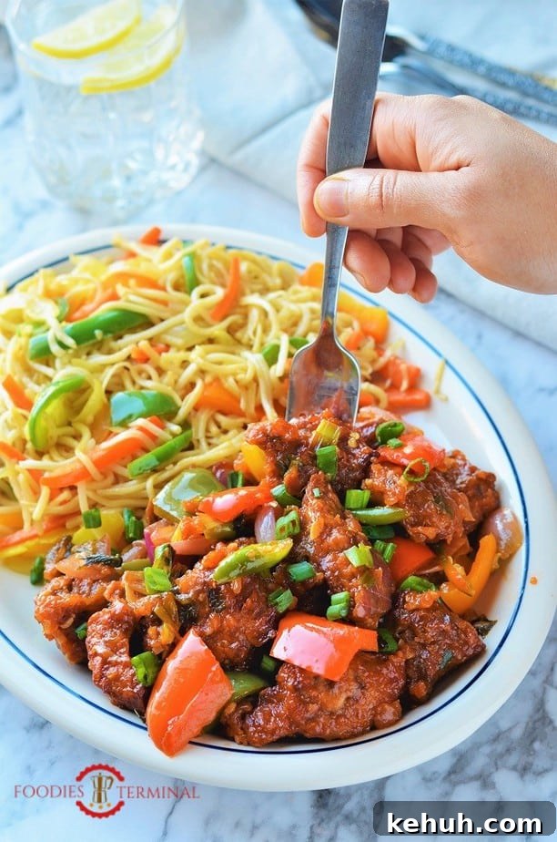 Chilli Chicken recipe air fryer served with hakka noodles