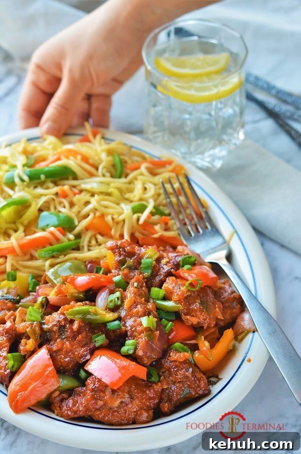 Indian style chilli chicken dry in a white plate