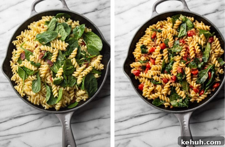 adding cooked pasta and spinach to the skillet