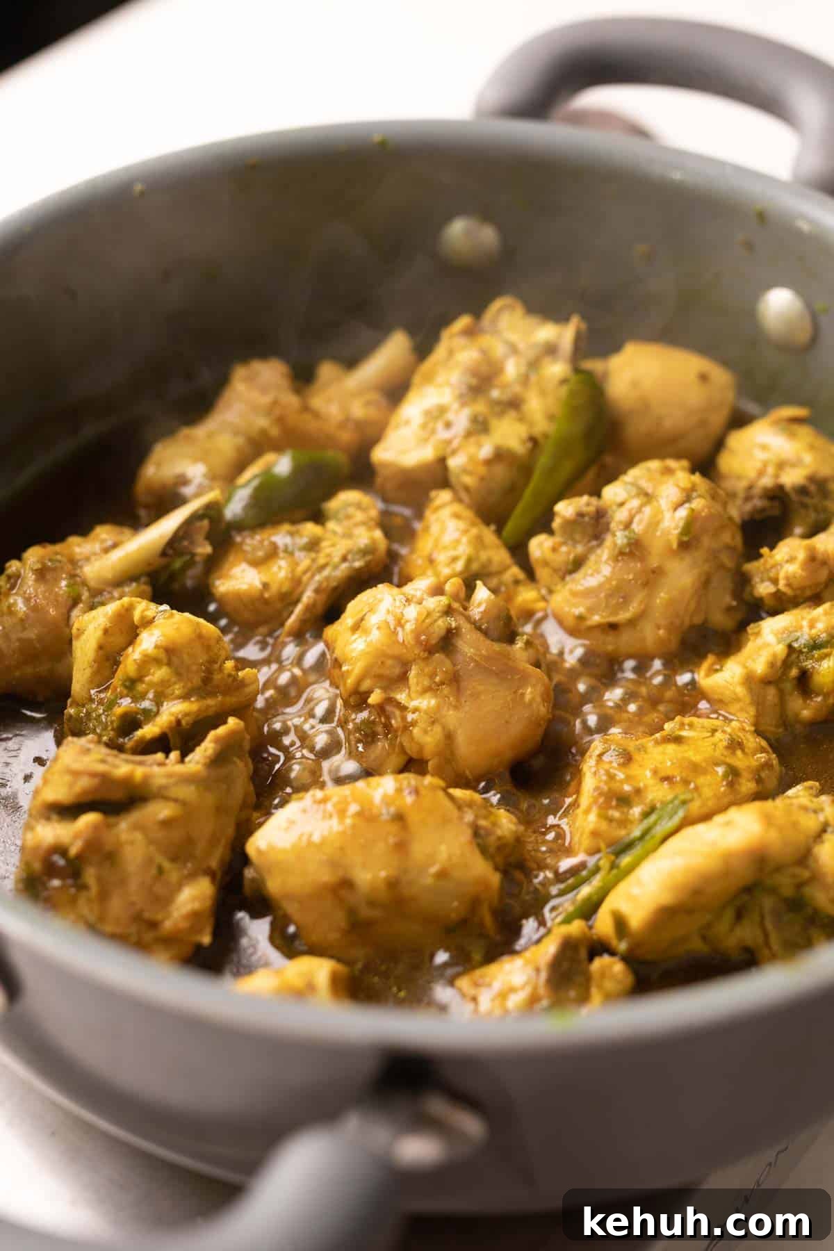 shot of andhra chilli chicken in a kadai