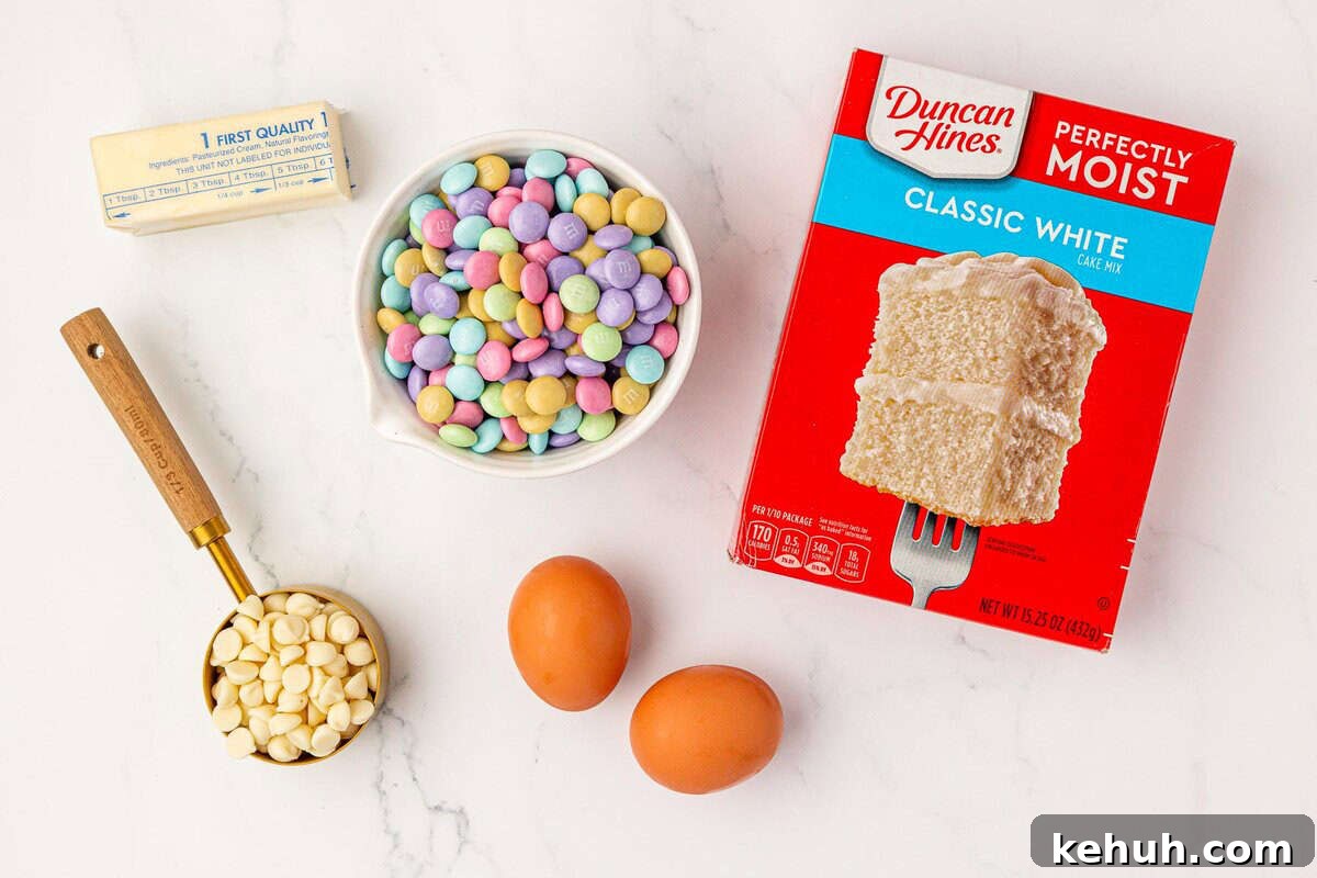 butter, white chocolate chips, Easter m&m's, eggs, and vanilla cake mix