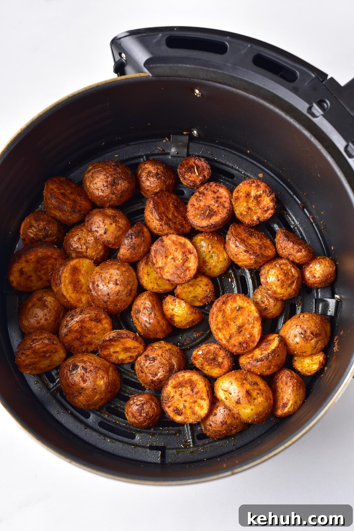 Crispy Air Fryer Baby Potatoes Recipe for Perfectly Roasted Bites 5 small potatoes in air fryer basket