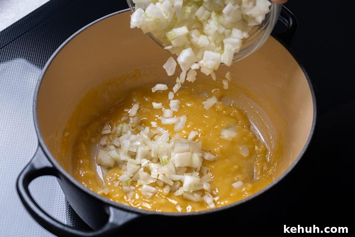 Creamy Parmesan Spinach Recipe — Quick Sautéed Side Dish 4 pot with flour, garlic and onion