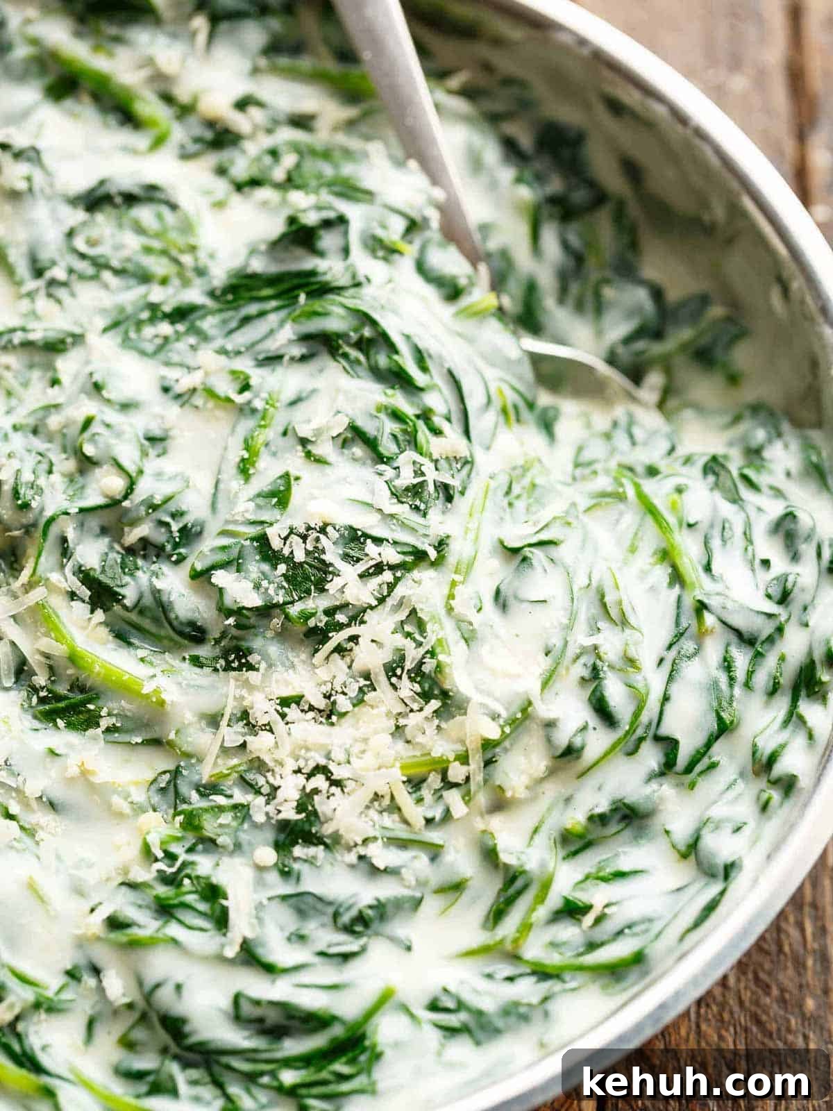 Creamy Parmesan Spinach Recipe — Quick Sautéed Side Dish 8 Easy Creamed Spinach in a steel bowl