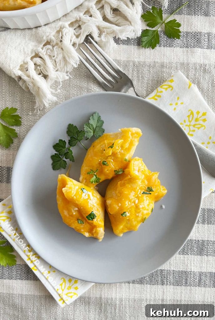 Pierogi-Stuffed Shells with Creamy Potato & Cheddar Filling 3 lazy perogi stuffed shells on the table