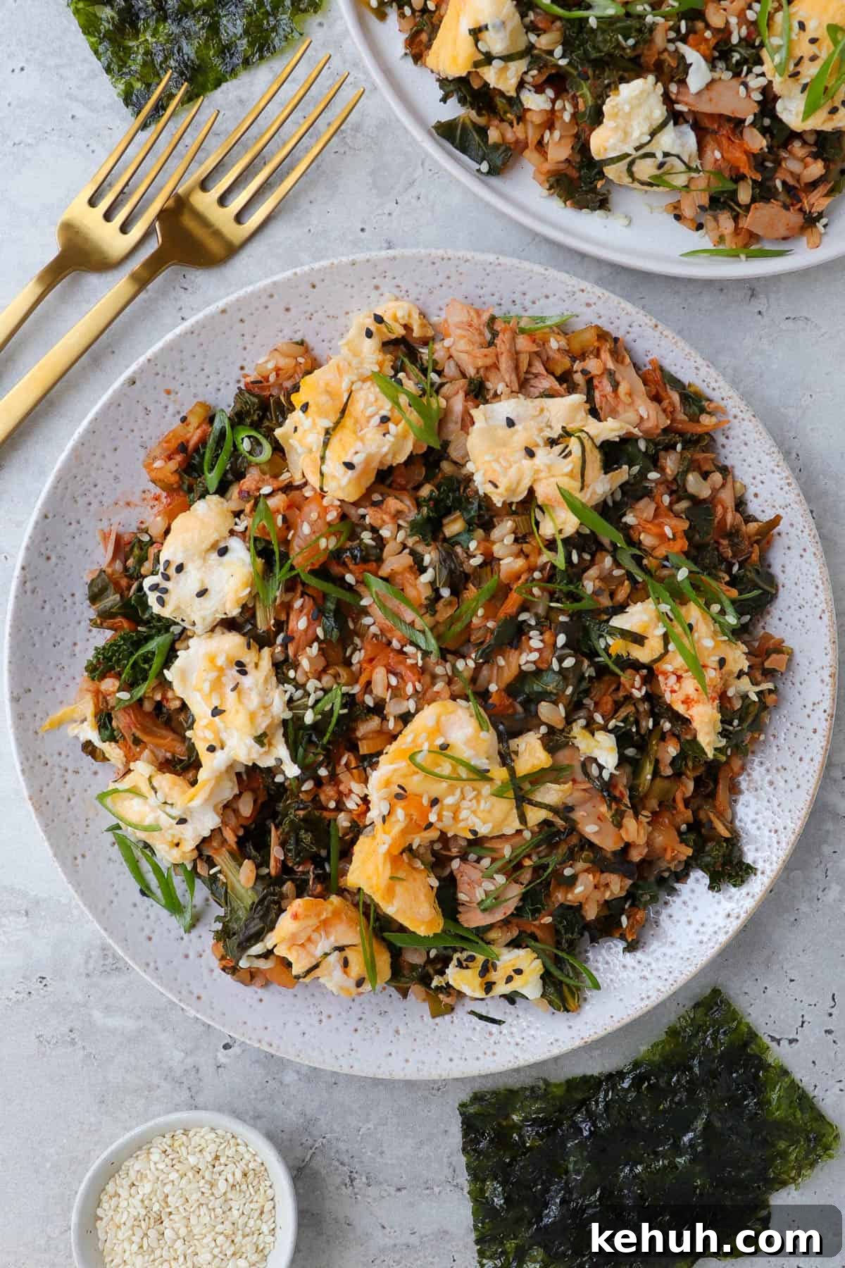 Spicy Tuna and Kimchi Fried Rice Recipe for Quick Weeknight Meals 2 Two plates of the dish whit forks.