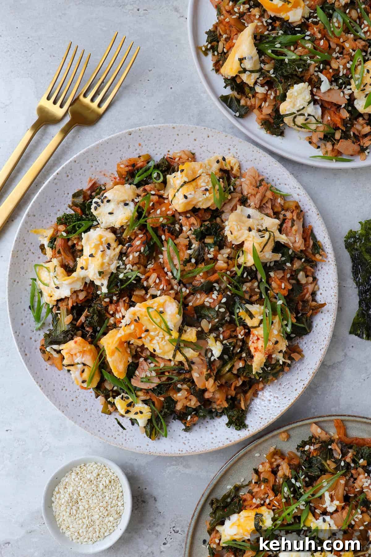 Spicy Tuna and Kimchi Fried Rice Recipe for Quick Weeknight Meals 7 Three plates of tuna kimchi fried rice.