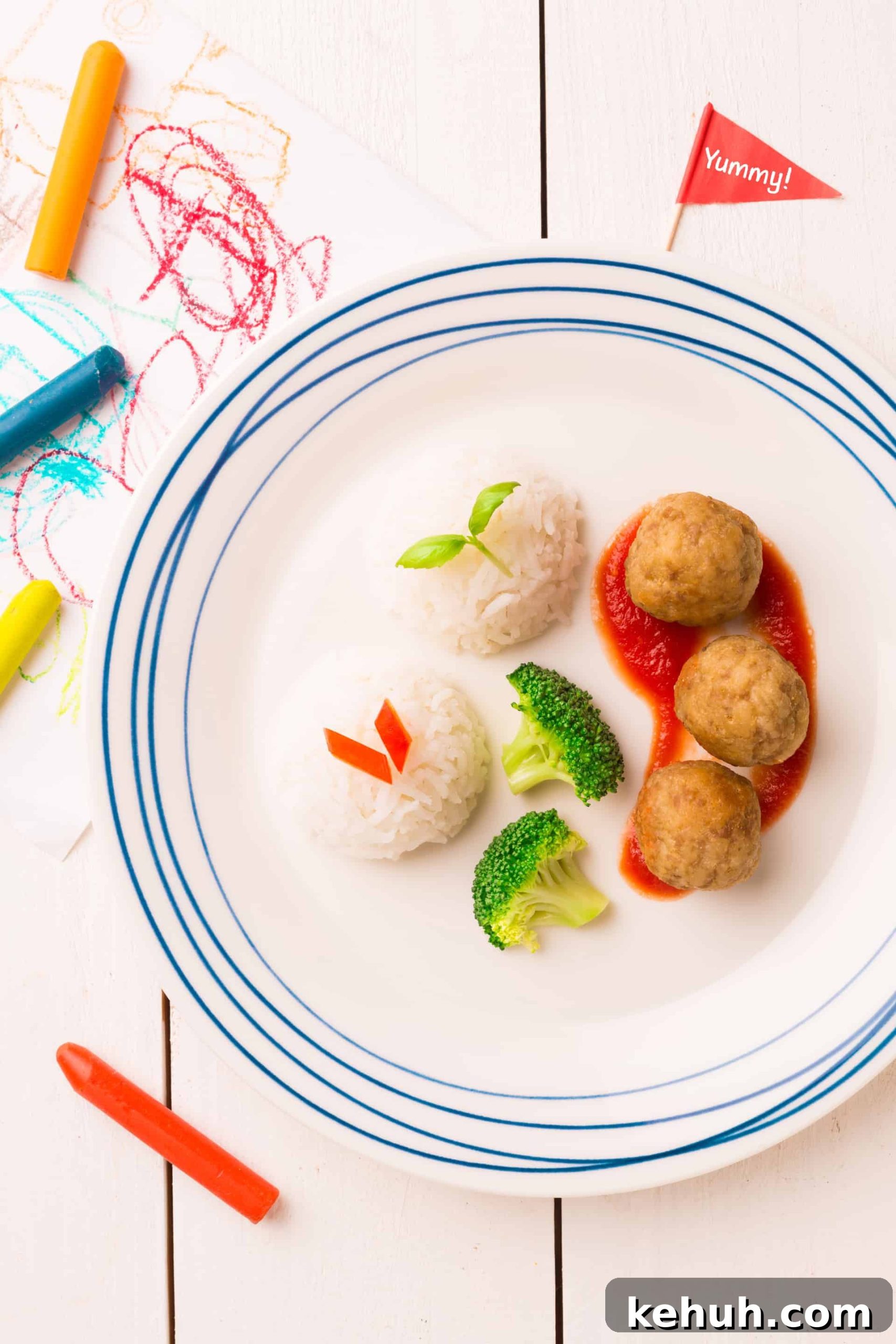 Getting Toddlers to Eat Meat: Practical Tips Parents Can Use 2 kids plate with meatballs, rice, and broccoli
