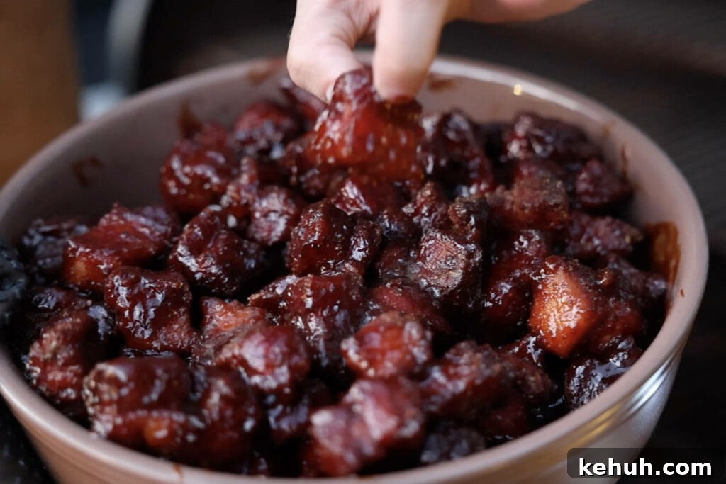 Pan of pork belly burnt ends after finishing smoking.