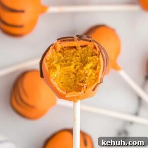 Moist Pumpkin Bundt Cake with Spiced Glaze 15 Pumpkin cake pop up close.