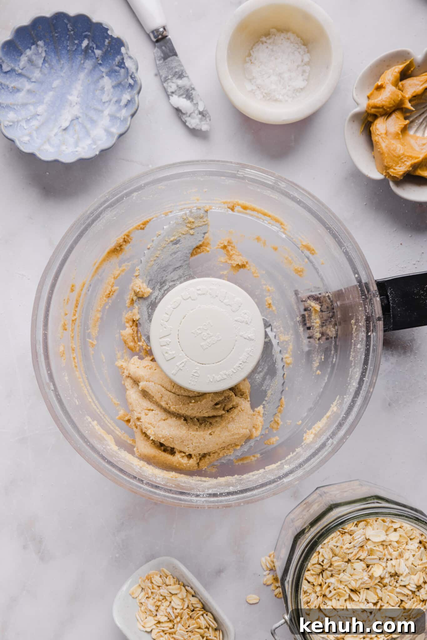 Oat flour shortbread mixture in a food processor.