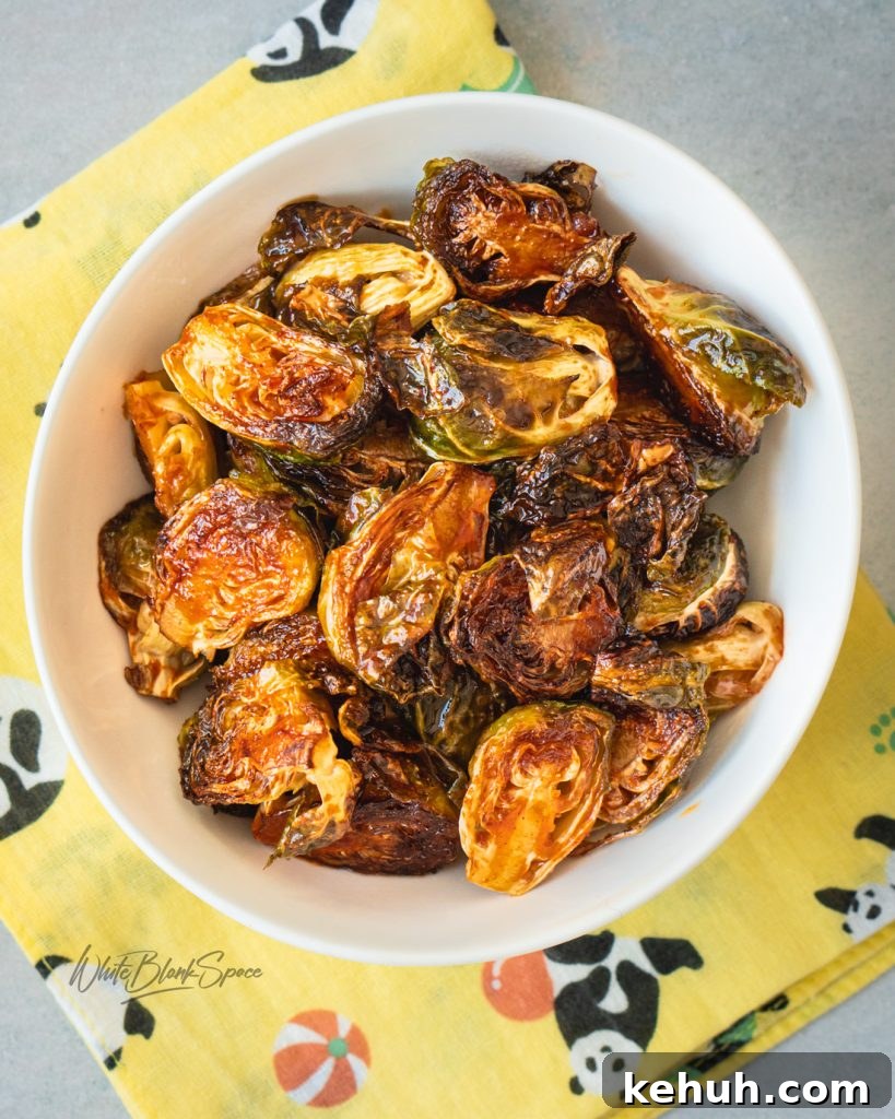 Spicy Gochujang Roasted Brussels Sprouts with Crispy Edges 3 burnt brussels sprouts with spicy sauce