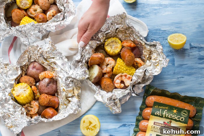 Low Country Boil Foil Pack Recipe for Seafood Camping Meals 3 Low Country Boil Foil Packs ready for the grill — less fuss and just minutes to assemble.