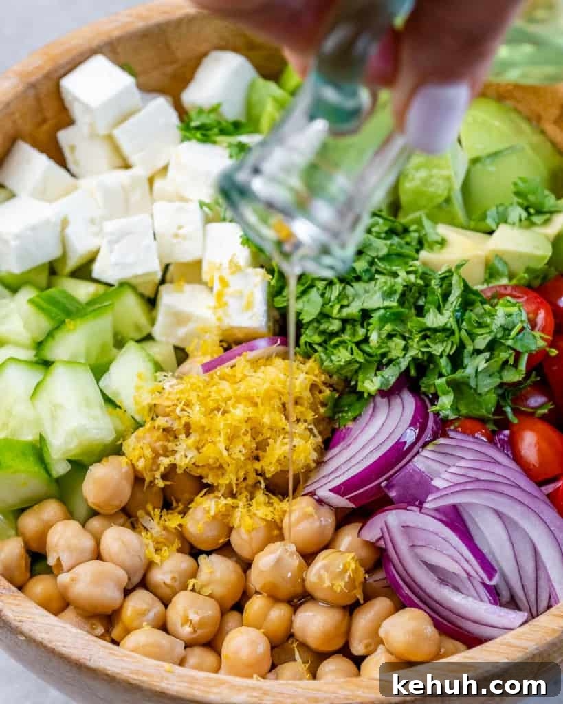 Mediterranean Chickpea and Feta Salad Recipe 6 Drizzle oil over the salad ingredients.