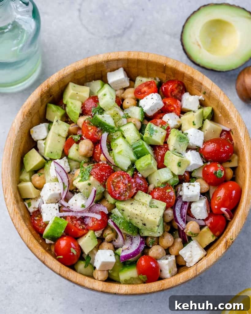Mediterranean Chickpea and Feta Salad Recipe 8 top view of salad in a bowl wooden bowl