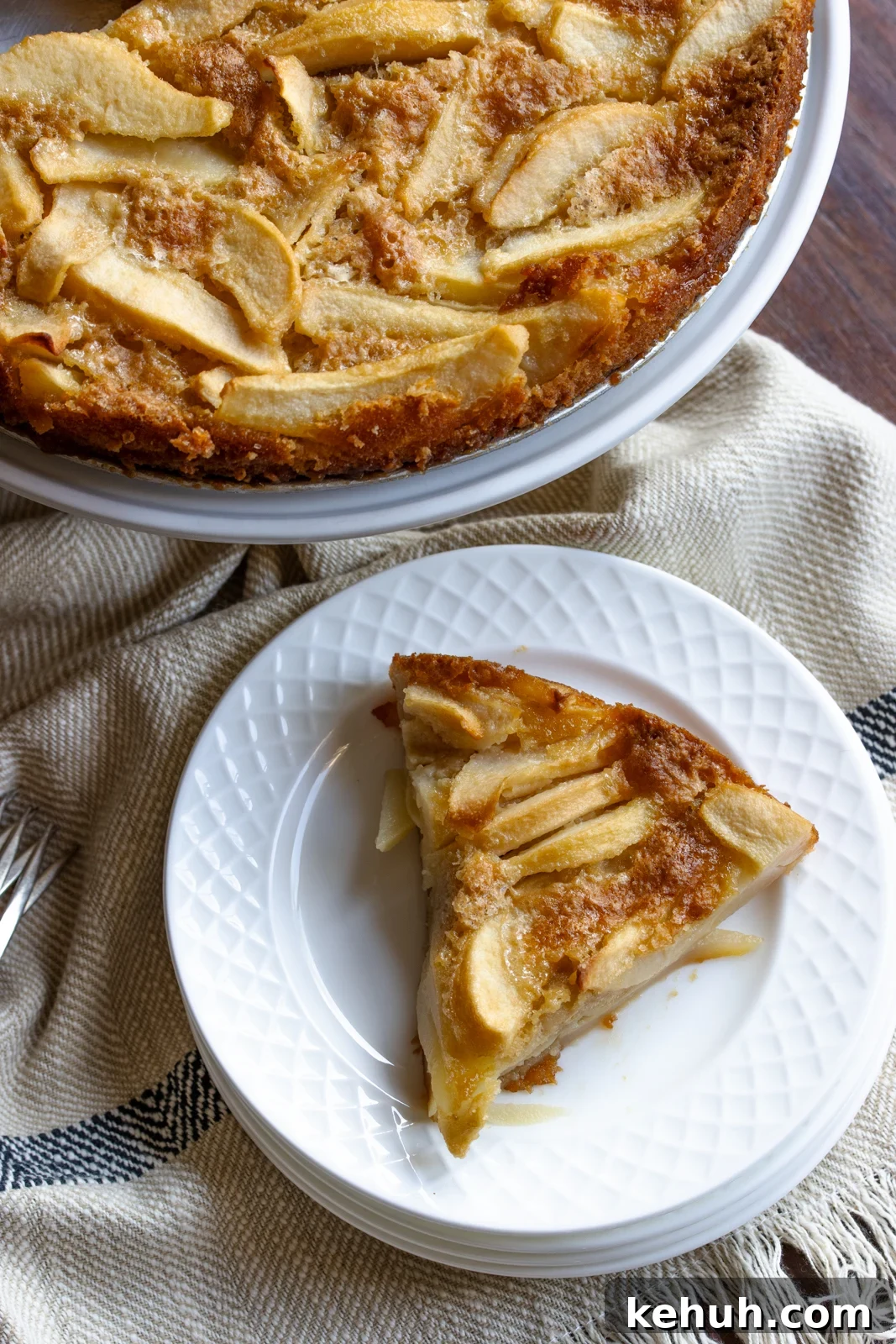 pear cake slice on a white plate