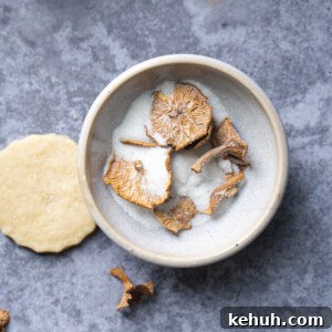 Candy cap mushrooms in a bowl of sugar