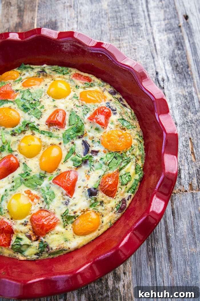 Mediterranean Vegetable Frittata finished in a pie pan.