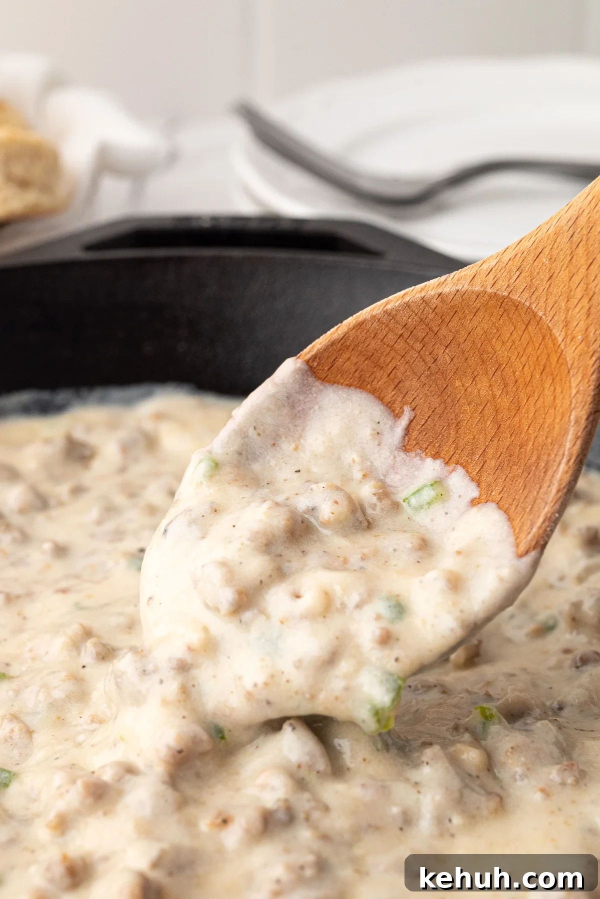 jalapeno sausage gravy in a cast iron skillet