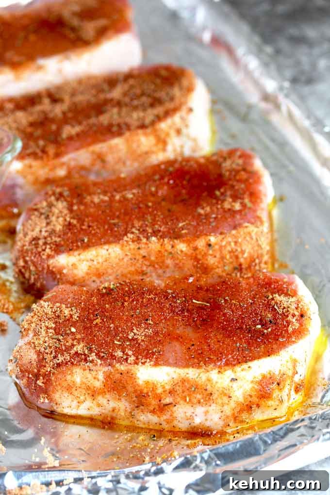 Pork Chops seasoned on both sides with dried rub