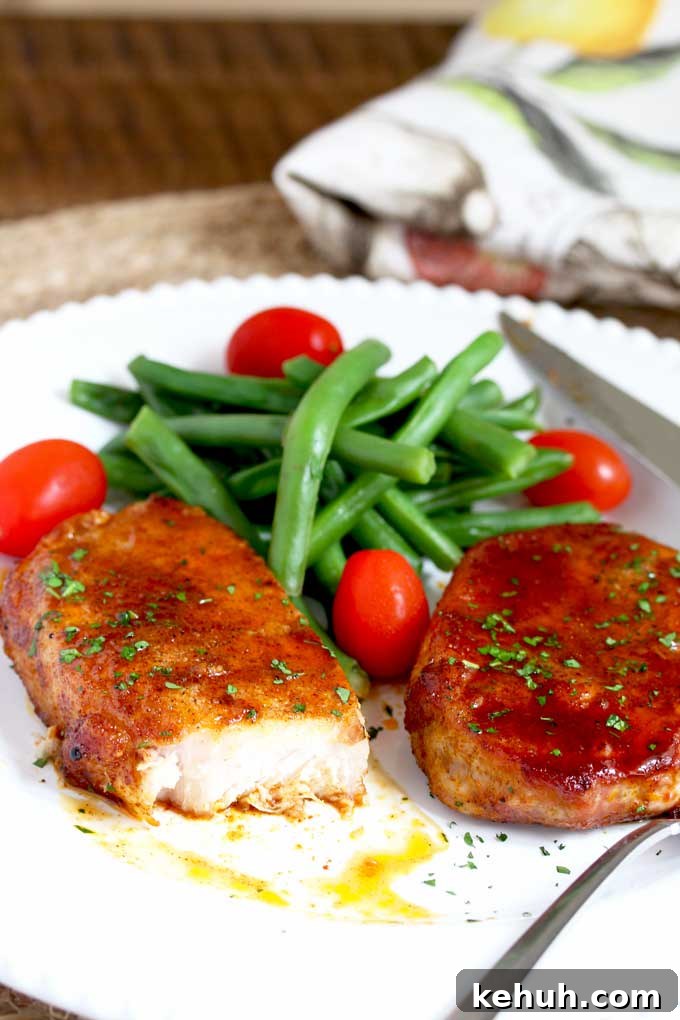 Served Pork Chops with green beans and tomatoes.