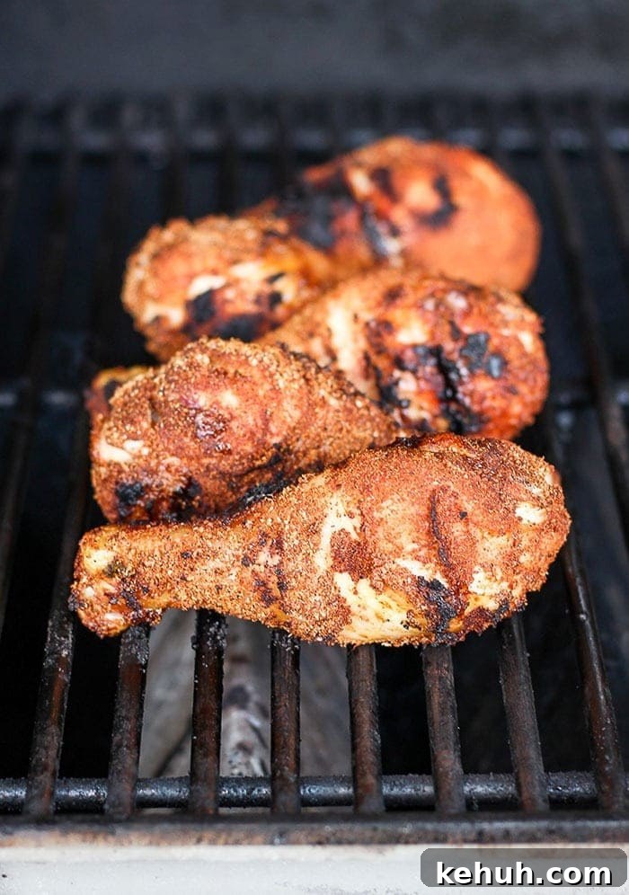chicken legs on grill.