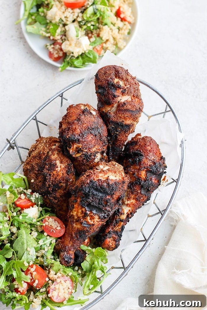 chicken legs in basket with salad.