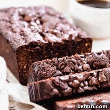 This super decadent paleo chocolate zucchini bread is so moist and the perfect breakfast, dessert or on-the-go snack for you. This zucchini bread is gluten free, dairy free and refined sugar free. #paleo #zucchinibread #glutenfree #chocolate