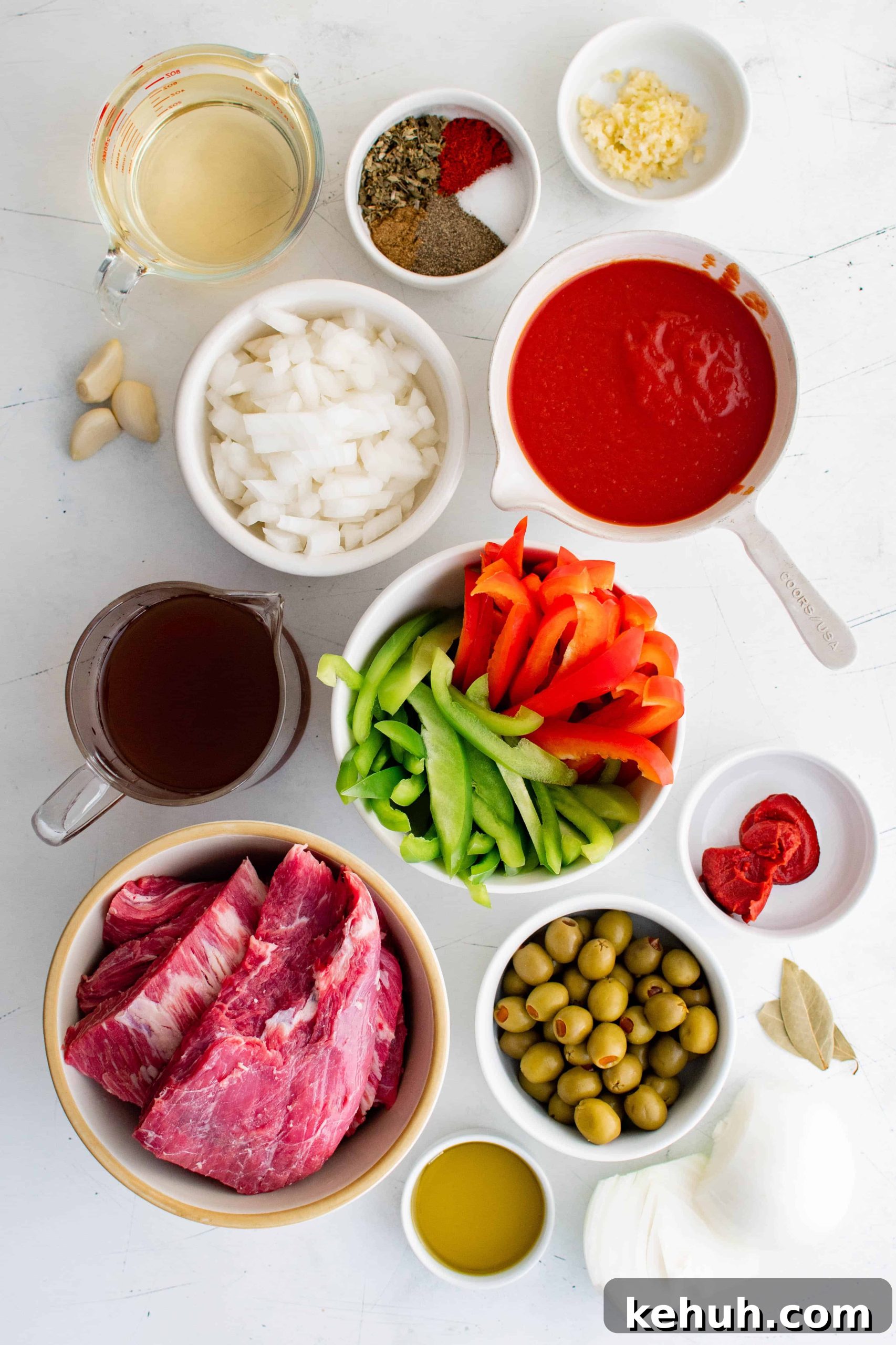 Authentic Cuban Ropa Vieja Recipe — Slow-Cooked Shredded Beef 3 Ingredients needed to make ropa vieja set aside in individual serving bowls.