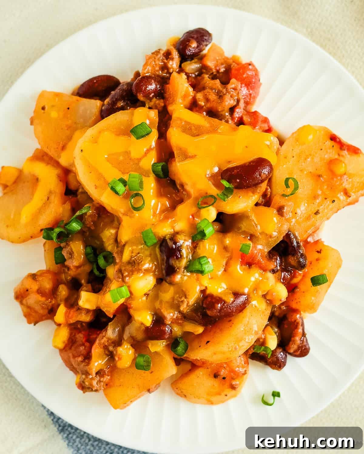 Slow-Cooker Cowboy Casserole Recipe for Busy Weeknights 7 overhead shot of plate of cheesy cowboy casserole