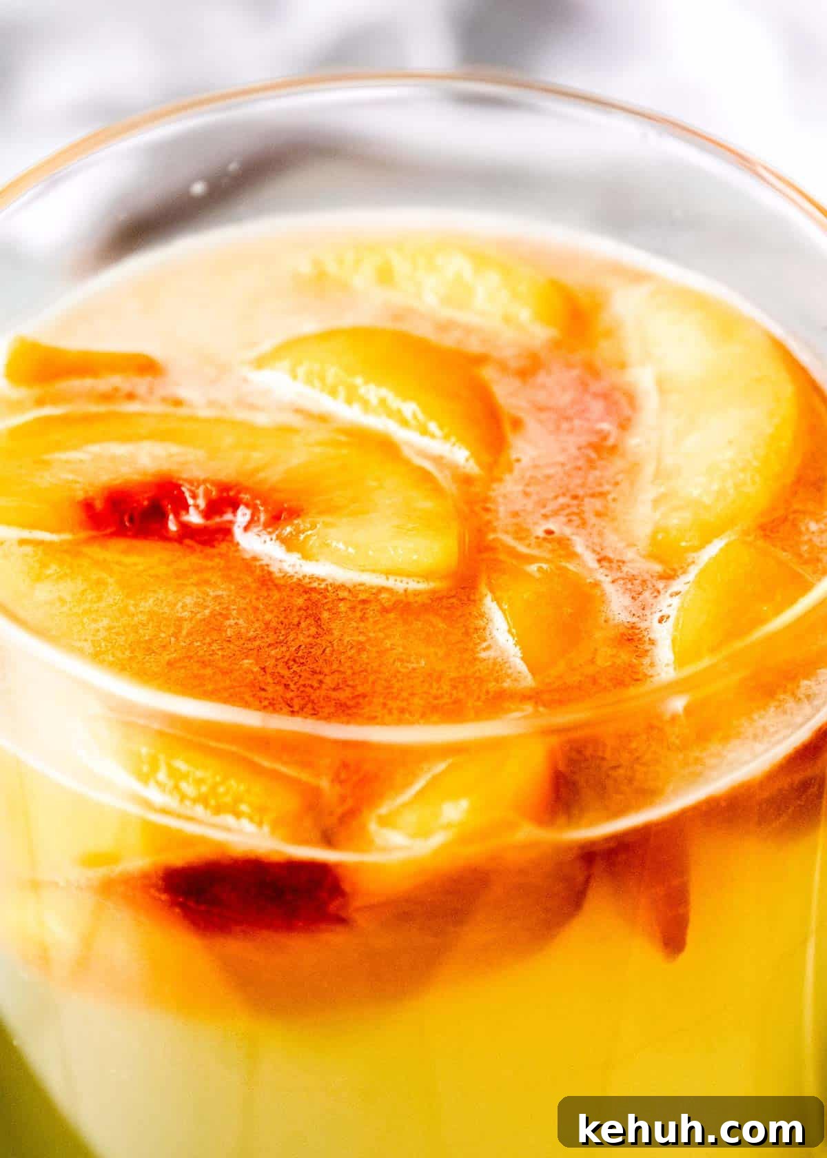 Peach Bourbon Lemonade Recipe — Refreshing Summer Cocktail 9 peach slices stirred into homemade lemonade