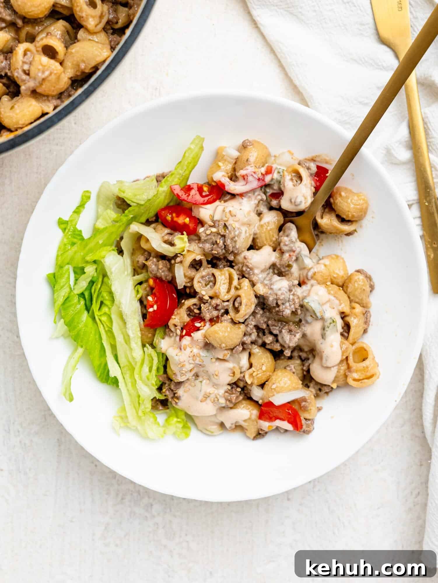 High-Protein Big Mac Pasta Meal-Prep Recipe 6 Cheeseburger pasta in a white bowl.