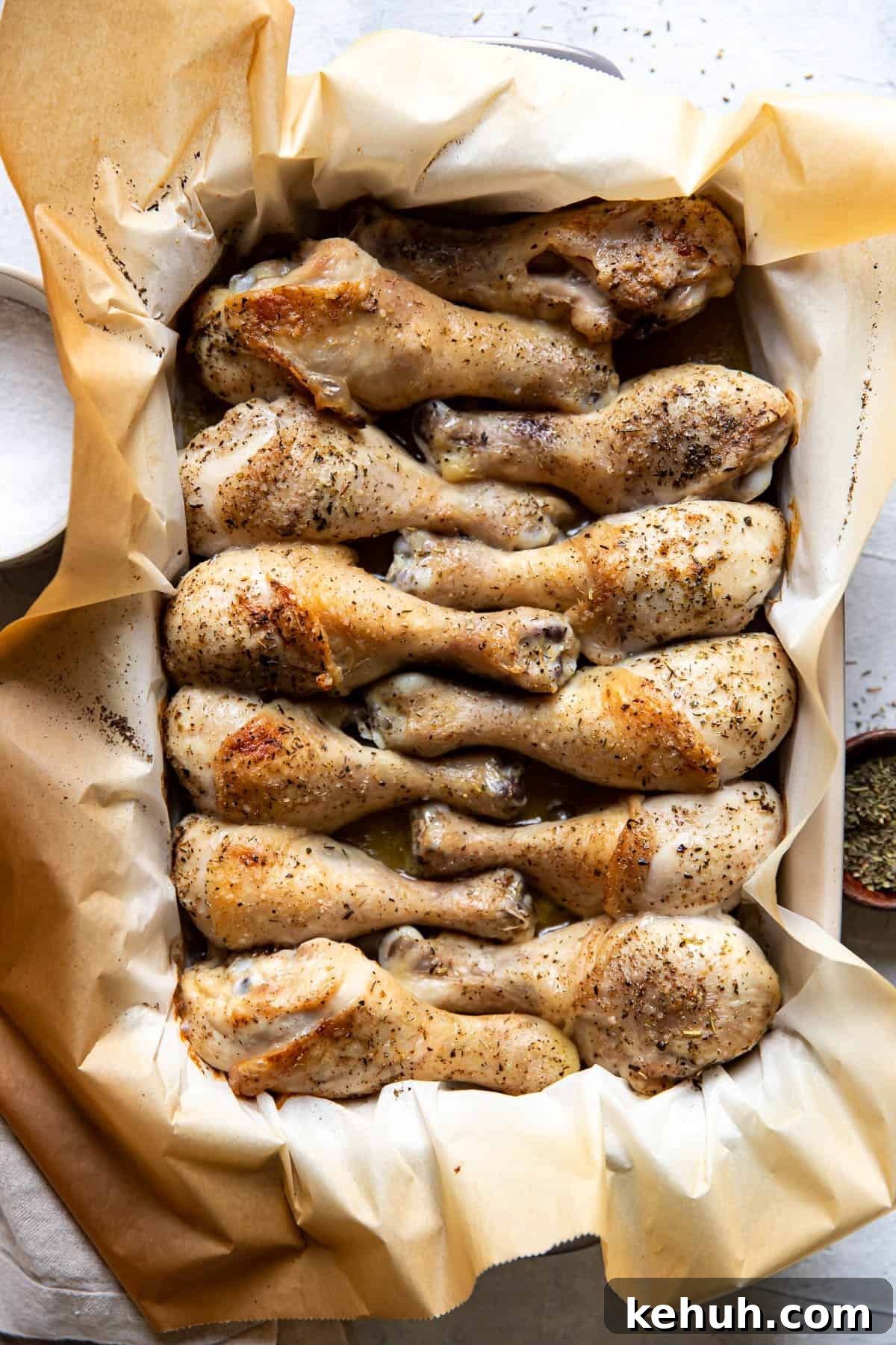 chicken drums in a baking dish.