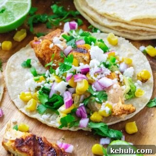 Mexican Street Corn Chicken Tacos Recipe for Flavorful Weeknight Meals 2 Mexican Street Corn Chicken Tacos bring together your love of Mexcian steet food elote and spicy chicken tacos. Made with fresh roasted corn, cilantro, lime, seasoned chicken and a creamy chipotle sauce, these Mexican Street Corn Chicken Tacos will have you begging for more!