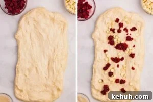 dough rolled out with raspberries and chocolate
