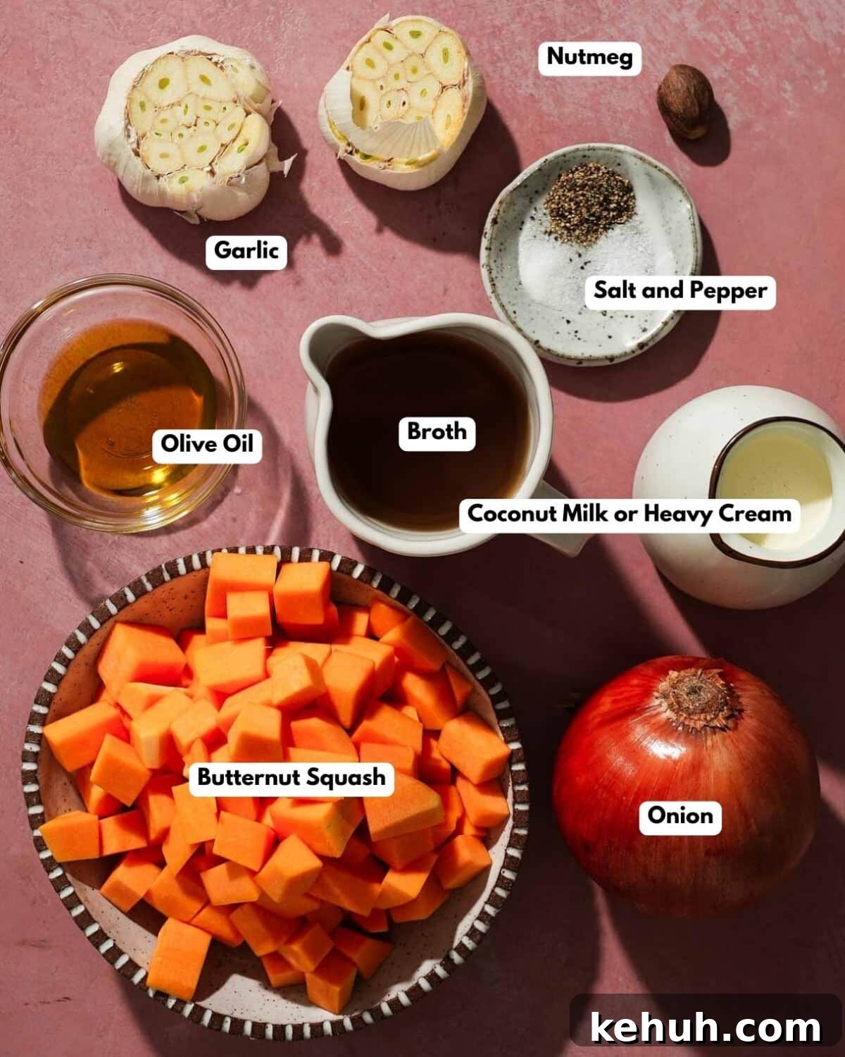 Creamy Roasted Butternut Squash Soup with Sage and Garlic 3 all the ingredients laid out on a pink board to make butternut squash soup
