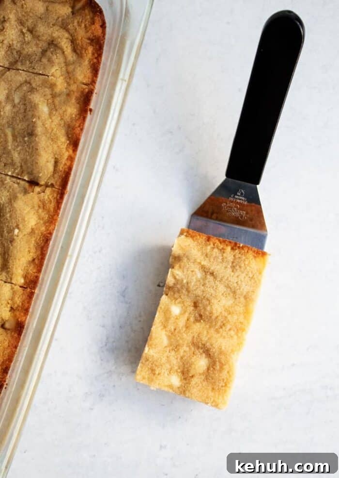 Keto Peanut Butter Chocolate Chip Cookie Bars 15 keto white chocolate macadamia nut cookies bar next to pan