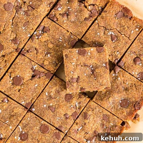 Keto Peanut Butter Chocolate Chip Cookie Bars 18 overhead view of keto peanut butter cookie bars on parchment paper