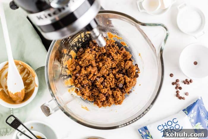 Keto Peanut Butter Chocolate Chip Cookie Bars 4 choczero milk chocolate chips folded into keto peanut butter cookie dough